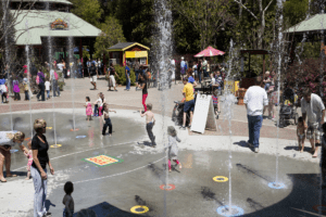 1999–2018: The first Panda Era 3 A crowded area of the zoo featuring Splash Fountain and the carousel.
