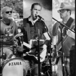 The Ben Wade band members play the guitar and drums