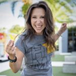 DJ Kate poses in a fun headshot