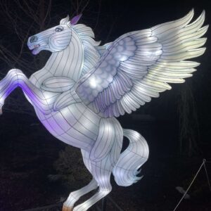 An illuminated lantern depicting a flying pegasus horse