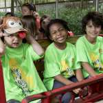 A group of Safari Campers pose on the Zoo Train.