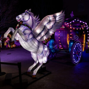 An illuminated lantern depicting an imaginary pegasus and magical carriage