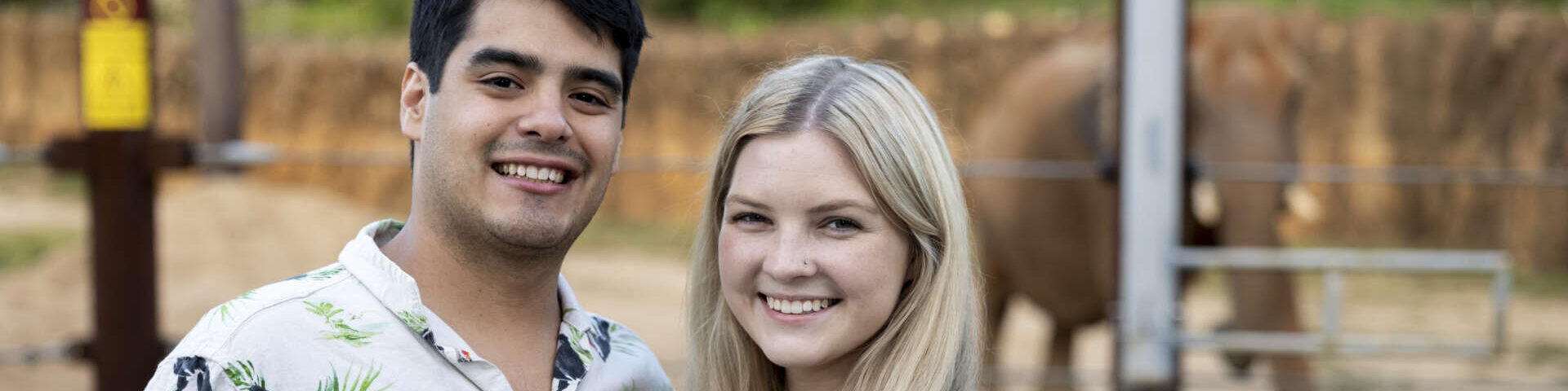 a man and woman posing during Sippin' Safari